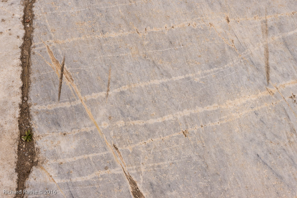 Scratches on Pavement Made by Ancient Chariots